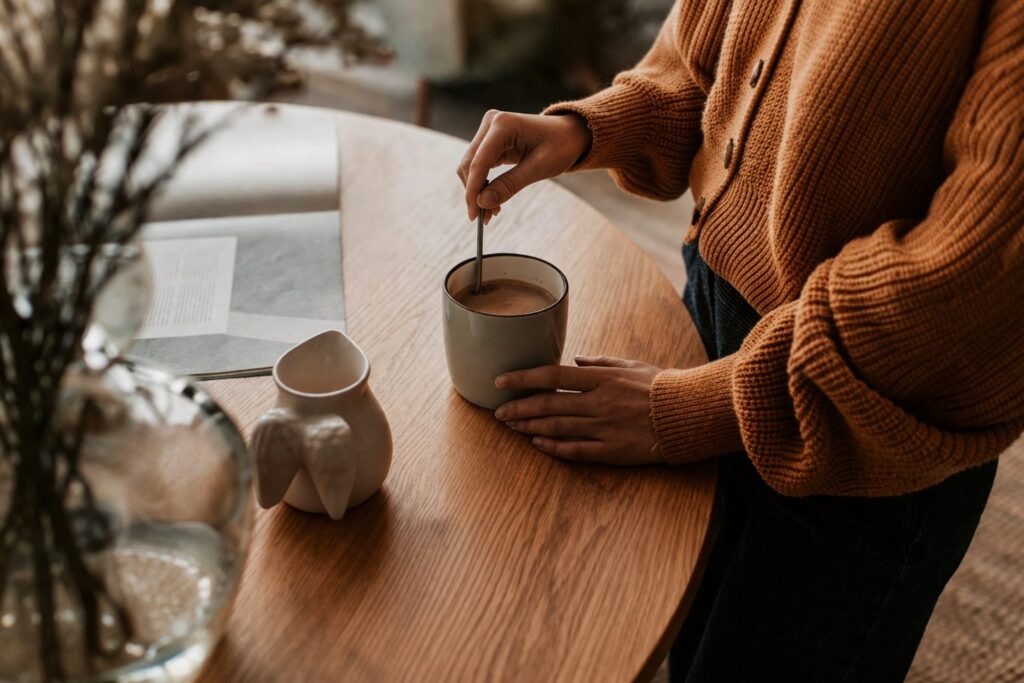 woman preparing coffee in the morning supporting metabolism and weight loss routine
