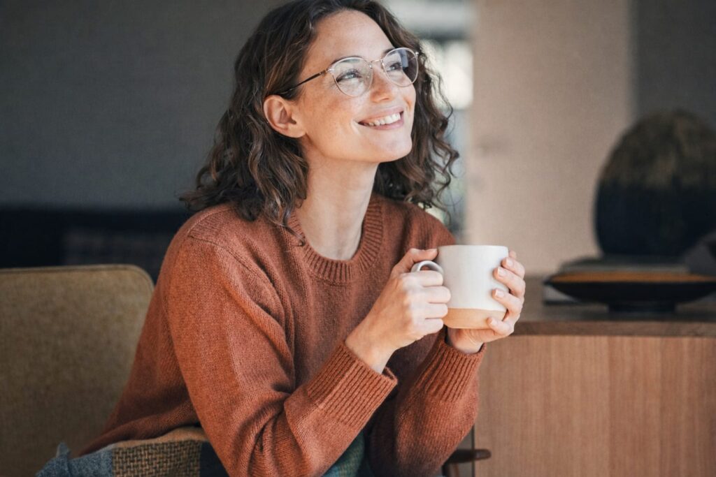 woman drinking coffee in the morning healthy lifestyle and metabolism support routine