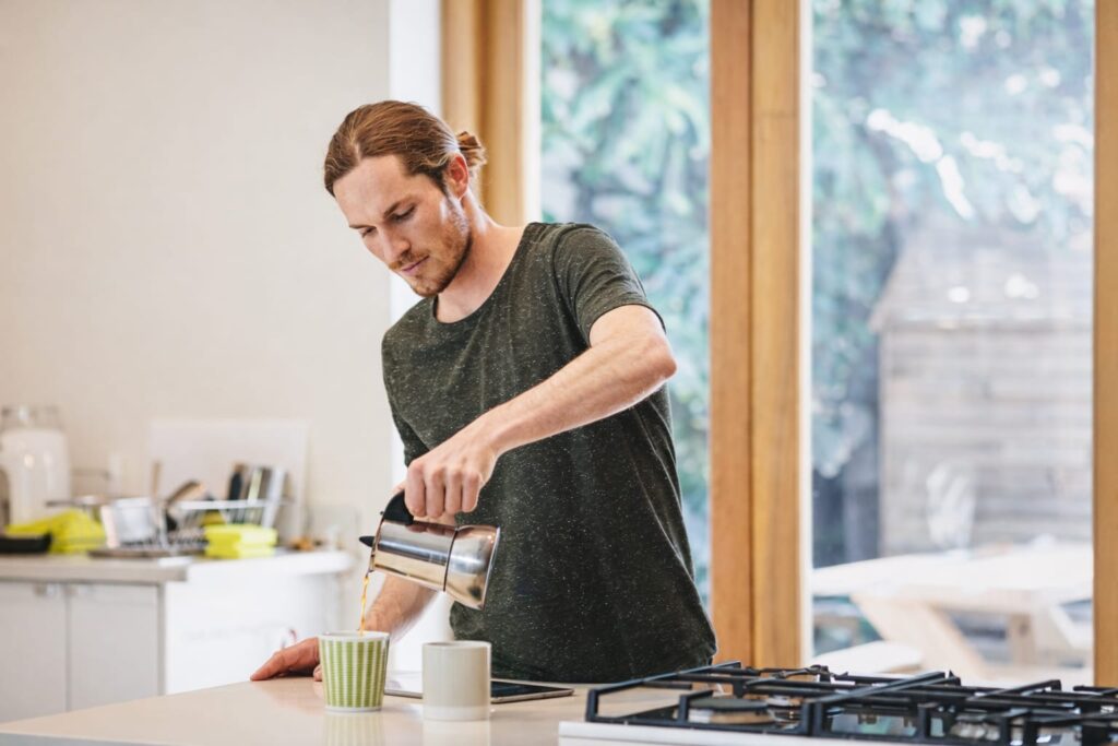 man drinking coffee in the morning routine where to buy java burn safely online